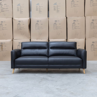 The Alyssa Three Seat Leather Sofa - Black available to purchase from Warehouse Furniture Clearance at our next sale event.
