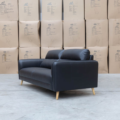The Alyssa Three Seat Leather Sofa - Black available to purchase from Warehouse Furniture Clearance at our next sale event.