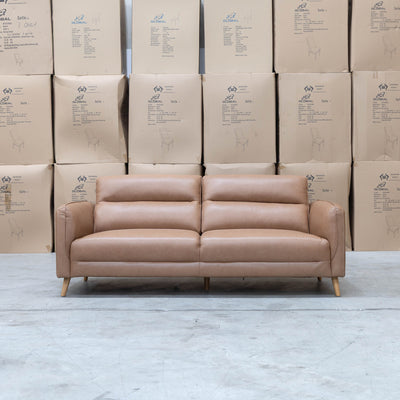 The Alyssa Three Seat Leather Sofa - Tan available to purchase from Warehouse Furniture Clearance at our next sale event.