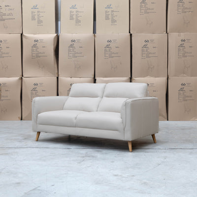 The Alyssa Two Seat Leather Sofa - White available to purchase from Warehouse Furniture Clearance at our next sale event.