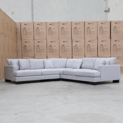 The Delta Deep Seated Corner Lounge - Silver available to purchase from Warehouse Furniture Clearance at our next sale event.