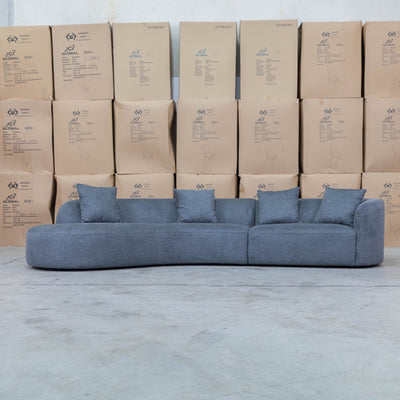 The Belview Curved Chaise Lounge - Dark Grey available to purchase from Warehouse Furniture Clearance at our next sale event.