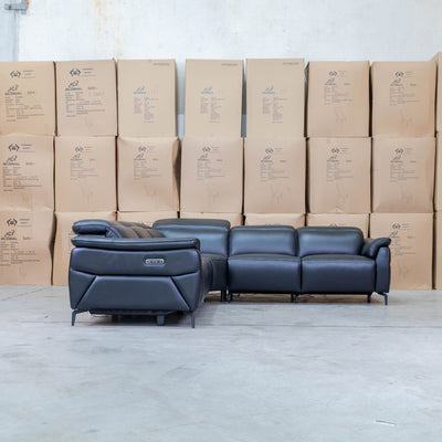The Cali Electric Leather Corner Recliner Lounge - Black available to purchase from Warehouse Furniture Clearance at our next sale event.