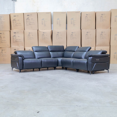 The Cali Electric Leather Corner Recliner Lounge - Black available to purchase from Warehouse Furniture Clearance at our next sale event.