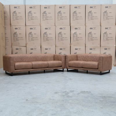 The Santosa Two Seat Fabric Sofa - Tan available to purchase from Warehouse Furniture Clearance at our next sale event.