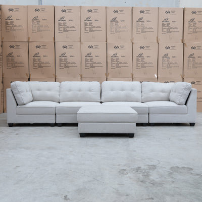 The Malta Modular Corner Lounge with Ottoman - Oat available to purchase from Warehouse Furniture Clearance at our next sale event.