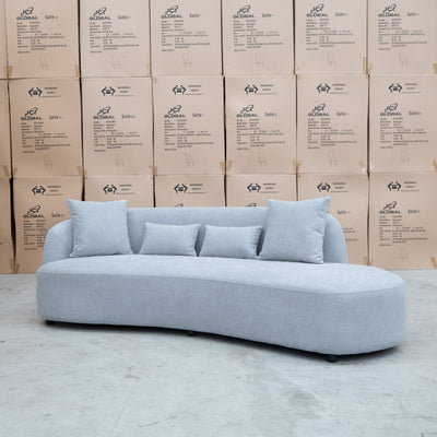 The Santorini Curved Chaise Sofa - Whisper available to purchase from Warehouse Furniture Clearance at our next sale event.