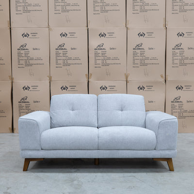 The Khloe Two Seat Fabric Sofa - Whisper available to purchase from Warehouse Furniture Clearance at our next sale event.