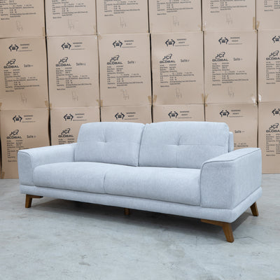 The Khloe Three Seat Fabric Sofa - Whisper available to purchase from Warehouse Furniture Clearance at our next sale event.