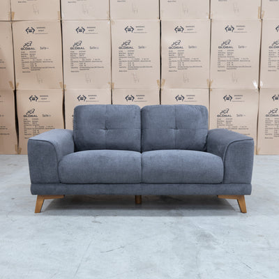 The Khloe Two Seat Fabric Sofa - Shadow available to purchase from Warehouse Furniture Clearance at our next sale event.