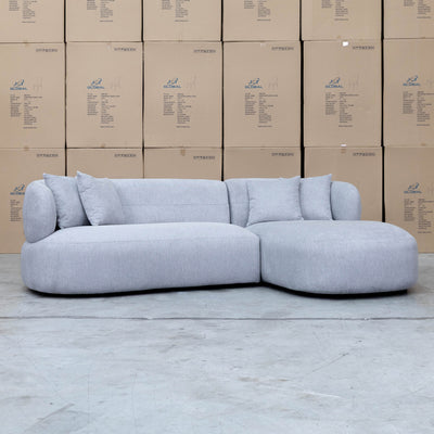 The Rhodes Curved Three Seat Chaise Lounge - Pewter available to purchase from Warehouse Furniture Clearance at our next sale event.