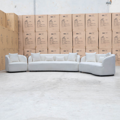 The Santorini Two Seat Sofa - Boucle Ivory available to purchase from Warehouse Furniture Clearance at our next sale event.