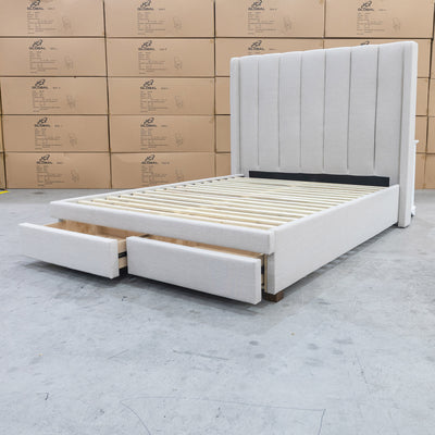 The Chester Queen Fabric Storage Bed - Oat White available to purchase from Warehouse Furniture Clearance at our next sale event.