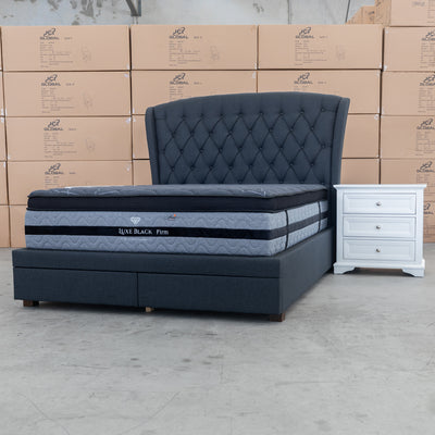 The Grace Queen Fabric Storage Bed - Charcoal available to purchase from Warehouse Furniture Clearance at our next sale event.