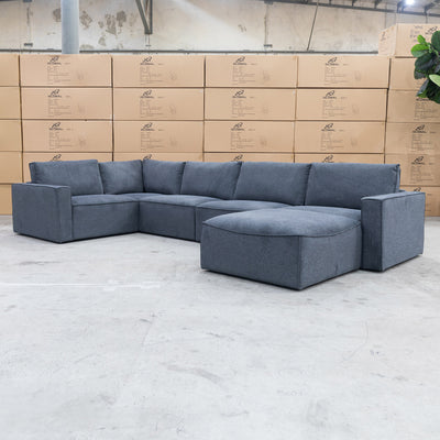 The Layne Modular Corner Lounge with Ottoman - Charcoal available to purchase from Warehouse Furniture Clearance at our next sale event.