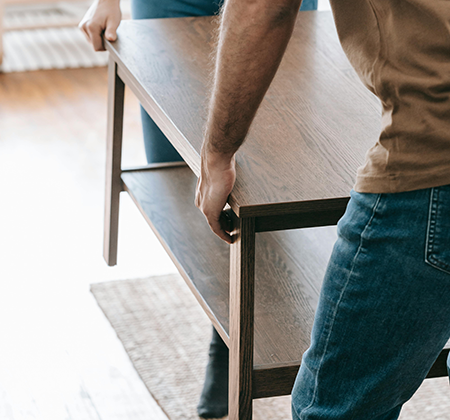 How to move heavy furniture without damaging it (or your back)