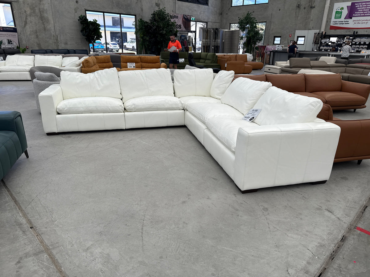 The HTL-12327-B Modular Corner Suite - Snow White - Floor Stock available to purchase from Warehouse Furniture Clearance at our next sale event.