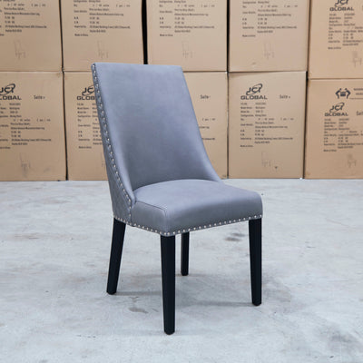 The Aquila Dining Chair - Ash available to purchase from Warehouse Furniture Clearance at our next sale event.
