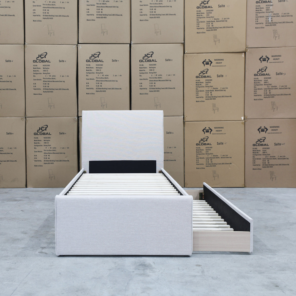 The York King Single Fabric Trundle Bed - Oat White (Reversible Trundle) available to purchase from Warehouse Furniture Clearance at our next sale event.