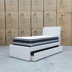 The York King Single Fabric Trundle Bed - Oat White (Reversible Trundle) available to purchase from Warehouse Furniture Clearance at our next sale event.