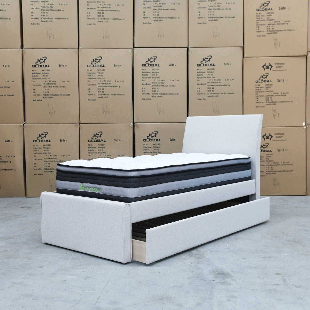 The York King Single Fabric Trundle Bed - Oat White (Reversible Trundle) available to purchase from Warehouse Furniture Clearance at our next sale event.