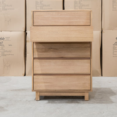 The Flintstone Tasmanian Oak Five Drawer Tallboy available to purchase from Warehouse Furniture Clearance at our next sale event.