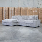 The Kalena Oversized Plush Feather & Foam LHF Chaise Lounge - Silver available to purchase from Warehouse Furniture Clearance at our next sale event.
