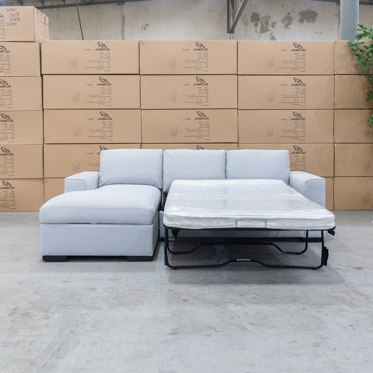 The Oakland Sofa Bed with LHF Storage Chaise - Silver available to purchase from Warehouse Furniture Clearance at our next sale event.
