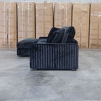 The Kalena Oversized Plush Feather & Foam LHF Chaise Lounge - Black available to purchase from Warehouse Furniture Clearance at our next sale event.