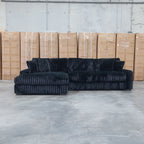 The Kalena Oversized Plush Feather & Foam LHF Chaise Lounge - Black available to purchase from Warehouse Furniture Clearance at our next sale event.