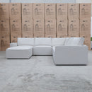 The Layne Modular Corner Lounge with Ottoman - Oat available to purchase from Warehouse Furniture Clearance at our next sale event.