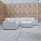 The Layne Modular Corner Lounge with Ottoman - Oat available to purchase from Warehouse Furniture Clearance at our next sale event.