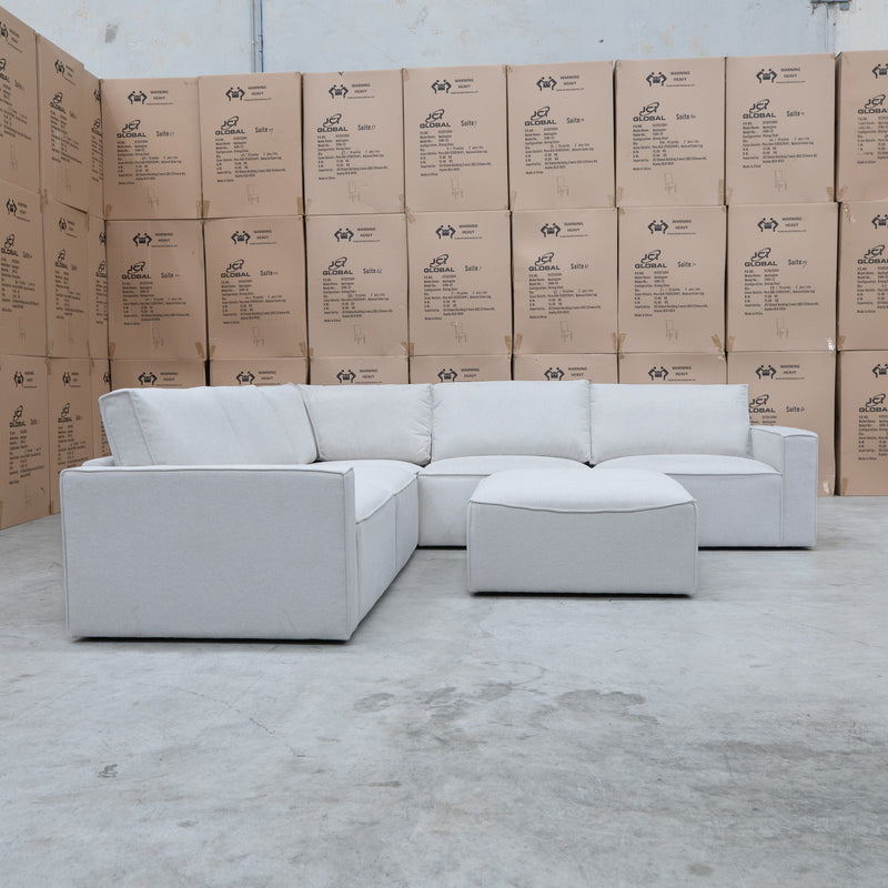 The Layne Modular Corner Lounge with Ottoman - Oat available to purchase from Warehouse Furniture Clearance at our next sale event.