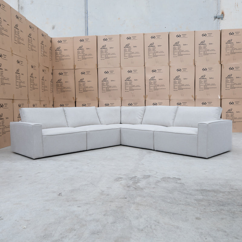 The Layne Modular Corner Lounge with Ottoman - Oat available to purchase from Warehouse Furniture Clearance at our next sale event.