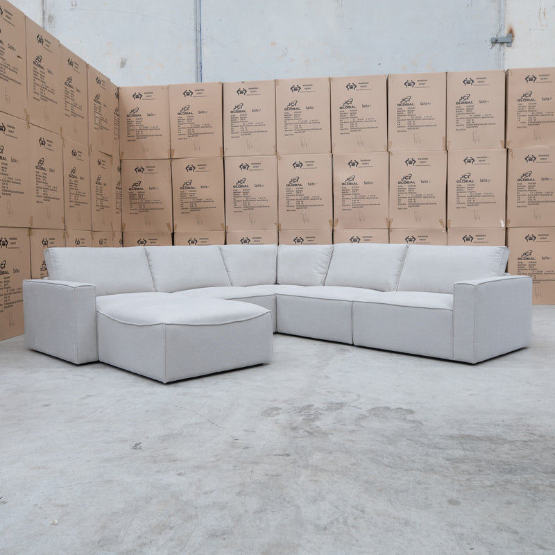 The Layne Modular Corner Lounge with Ottoman - Oat available to purchase from Warehouse Furniture Clearance at our next sale event.