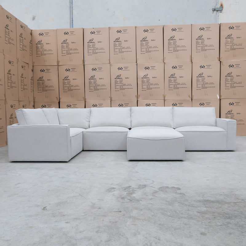 The Layne Modular Corner Lounge with Ottoman - Oat available to purchase from Warehouse Furniture Clearance at our next sale event.