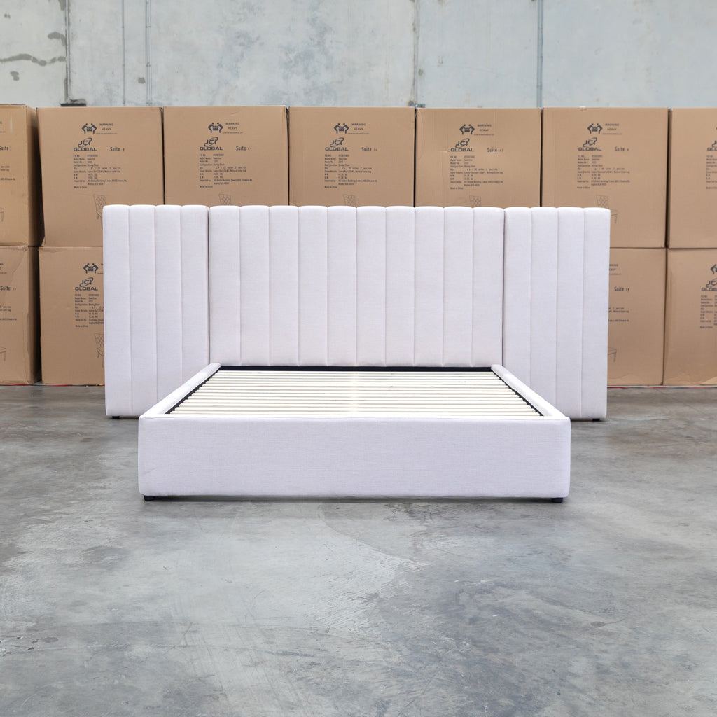 The Albany Queen Fabric Bed Extended Headboard - Beige available to purchase from Warehouse Furniture Clearance at our next sale event.
