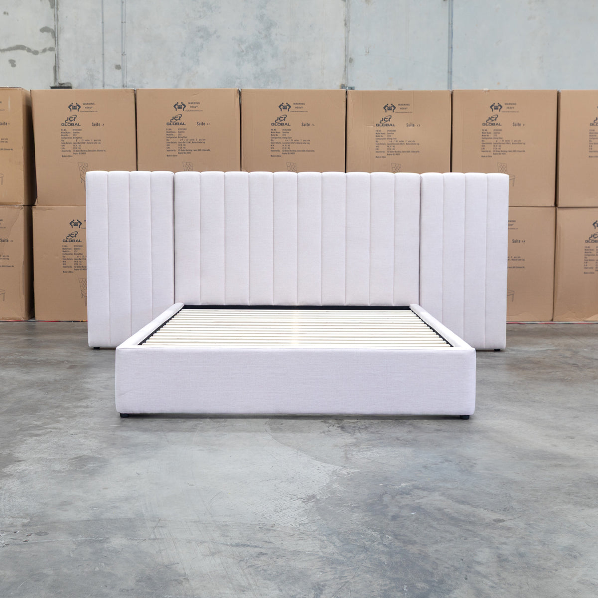 The Albany Queen Fabric Bed Extended Headboard - Beige available to purchase from Warehouse Furniture Clearance at our next sale event.