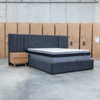 The Albany King Fabric Bed Extended Headboard - Charcoal available to purchase from Warehouse Furniture Clearance at our next sale event.