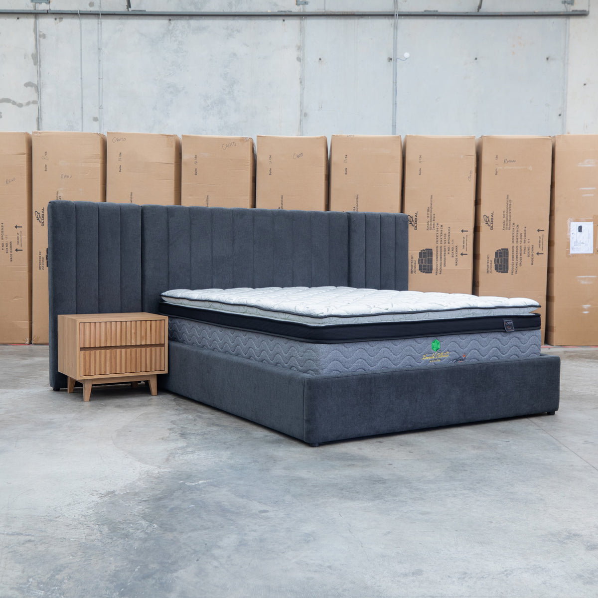 The Albany King Fabric Bed Extended Headboard - Charcoal available to purchase from Warehouse Furniture Clearance at our next sale event.