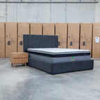 The Albany King Fabric Bed Extended Headboard - Charcoal available to purchase from Warehouse Furniture Clearance at our next sale event.