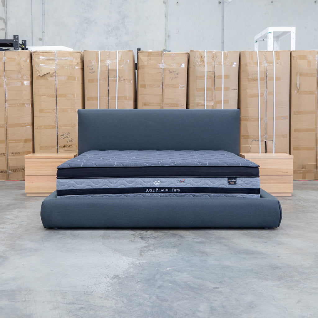 The Alina King Upholstered Bed - Charcoal available to purchase from Warehouse Furniture Clearance at our next sale event.