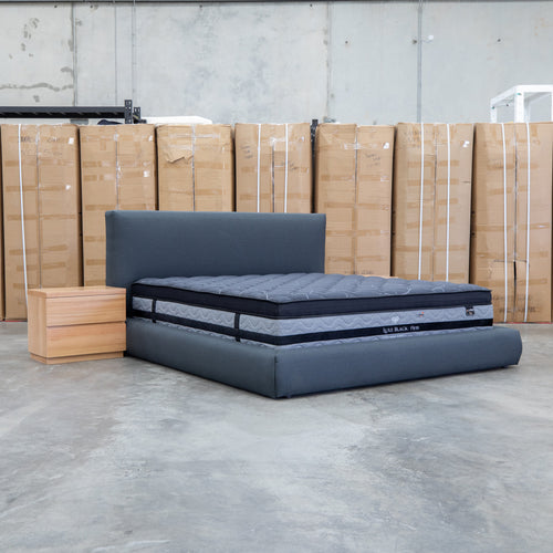 The Alina Queen Upholstered Bed - Charcoal available to purchase from Warehouse Furniture Clearance at our next sale event.
