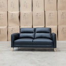 The Alyssa Two Seat Leather Sofa - Black available to purchase from Warehouse Furniture Clearance at our next sale event.