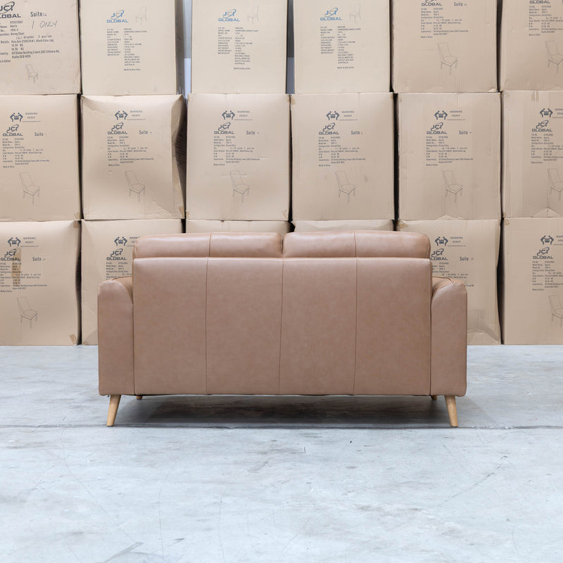 The Alyssa Two Seat Leather Sofa - Tan available to purchase from Warehouse Furniture Clearance at our next sale event.