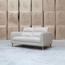 The Alyssa Two Seat Leather Sofa - White available to purchase from Warehouse Furniture Clearance at our next sale event.