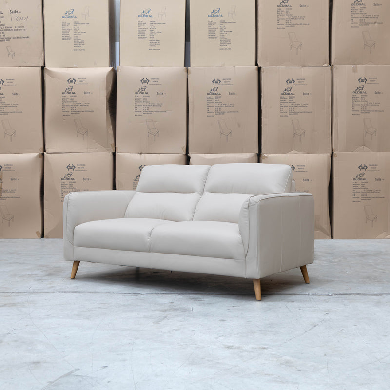 The Alyssa Two Seat Leather Sofa - White available to purchase from Warehouse Furniture Clearance at our next sale event.