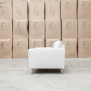 The Alyssa Two Seat Leather Sofa - White available to purchase from Warehouse Furniture Clearance at our next sale event.