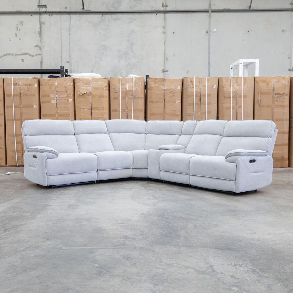 The Ambrose Modular Corner Lounge with Dual Electric Recliners - Cloud available to purchase from Warehouse Furniture Clearance at our next sale event.
