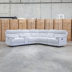 The Ambrose Modular Corner Lounge with Dual Electric Recliners - Cloud available to purchase from Warehouse Furniture Clearance at our next sale event.